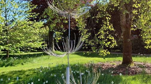 A delicate metal sculpture in the gardens at Uppak